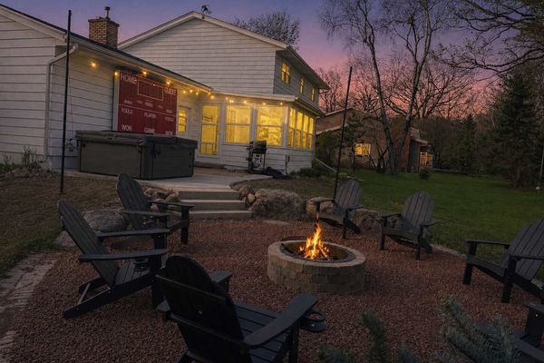 The property is on a dead end corner lot and has a private feel to it. We have yard games, a fire pit that seats 10, hot tub, dining table, and a walking path connected to the playground across the street.