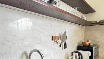 Fridge, microwave, coffee/tea maker, toaster