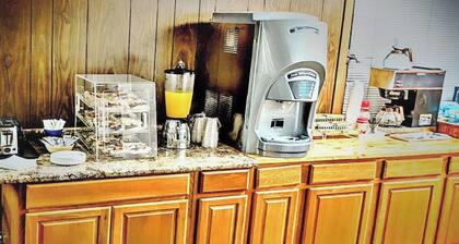 Comfortable Room with 2 Full Beds, 1 Twin Bed & Rollaway – for Budget Families