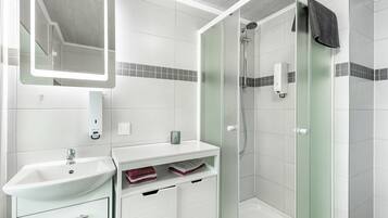 Shower, free toiletries, hair dryer, towels