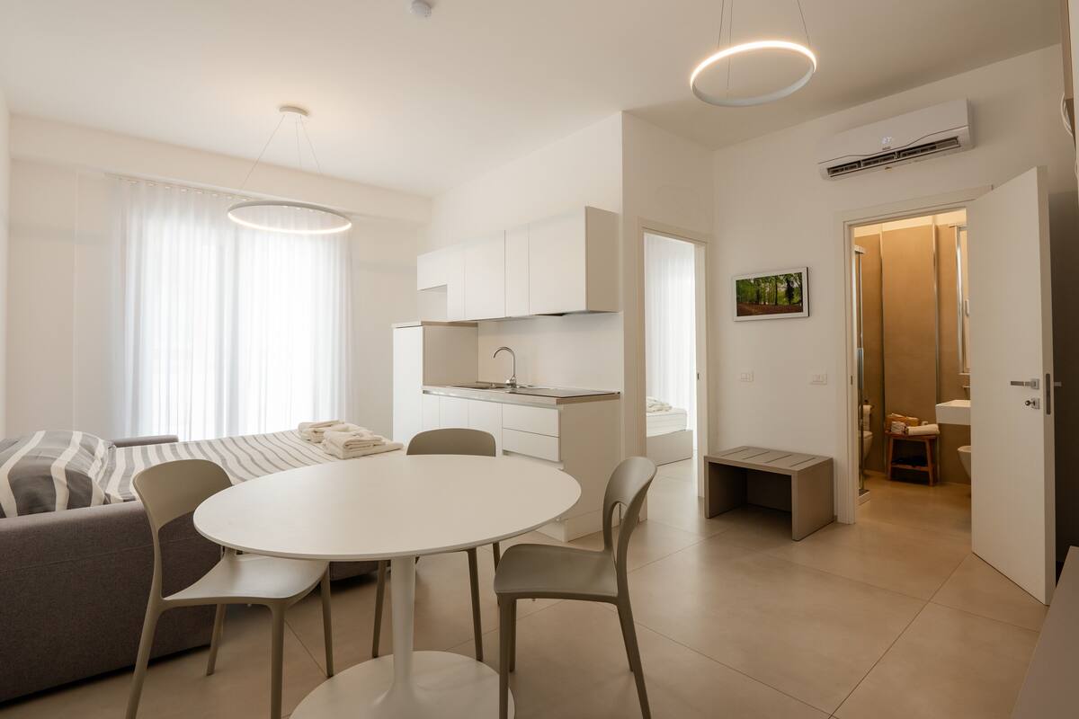 Apartamento Deluxe, patio, vistas a la ciudad | Zona de estar