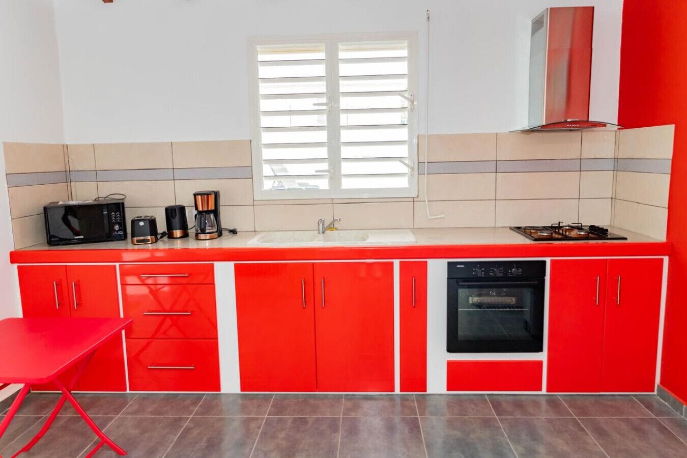 Fridge, microwave, coffee/tea maker, cookware/dishes/utensils