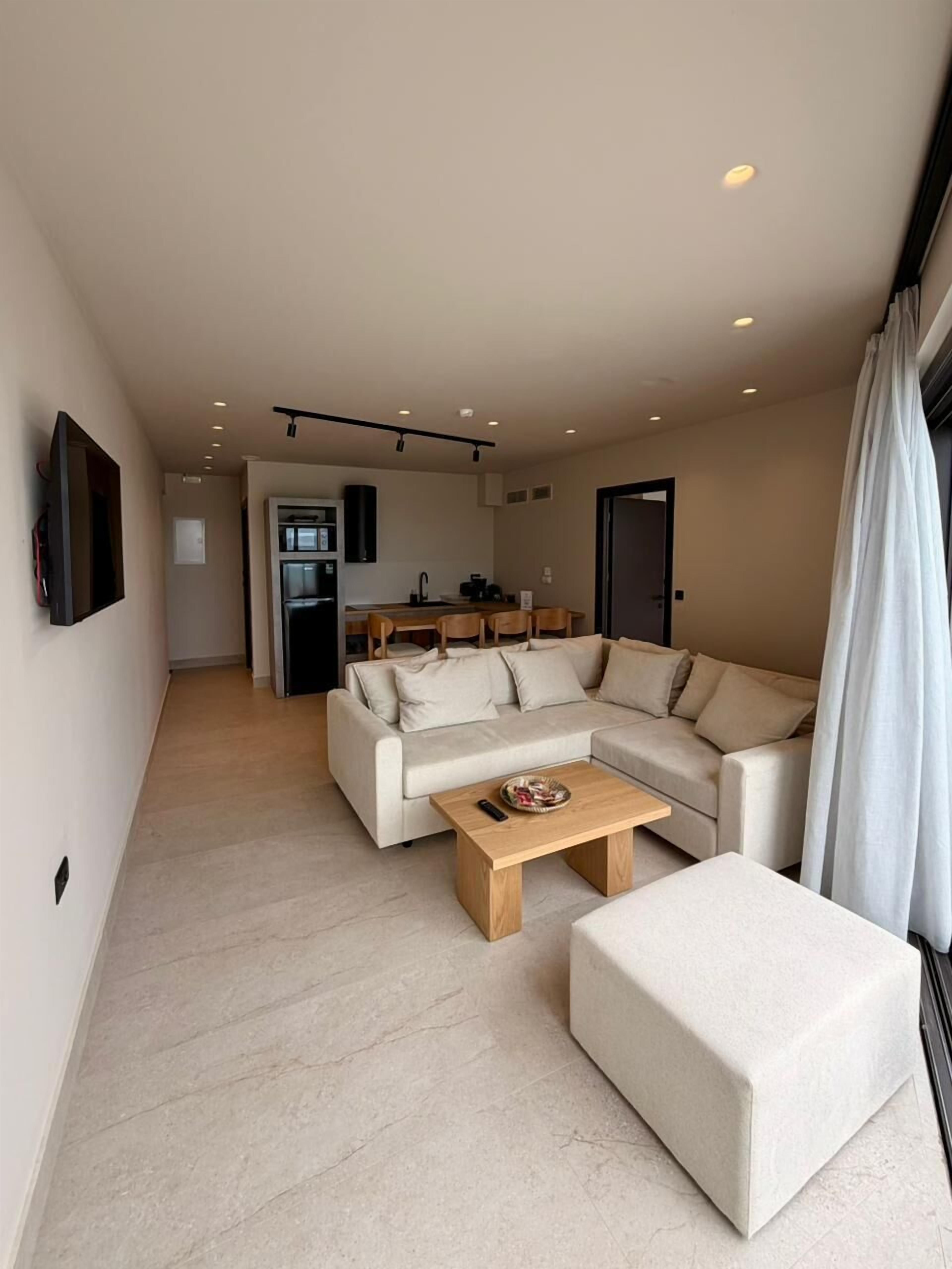 Seafront Two Bedroom Cave Suite with Private Pool | In-room safe, blackout curtains, soundproofing, iron/ironing board