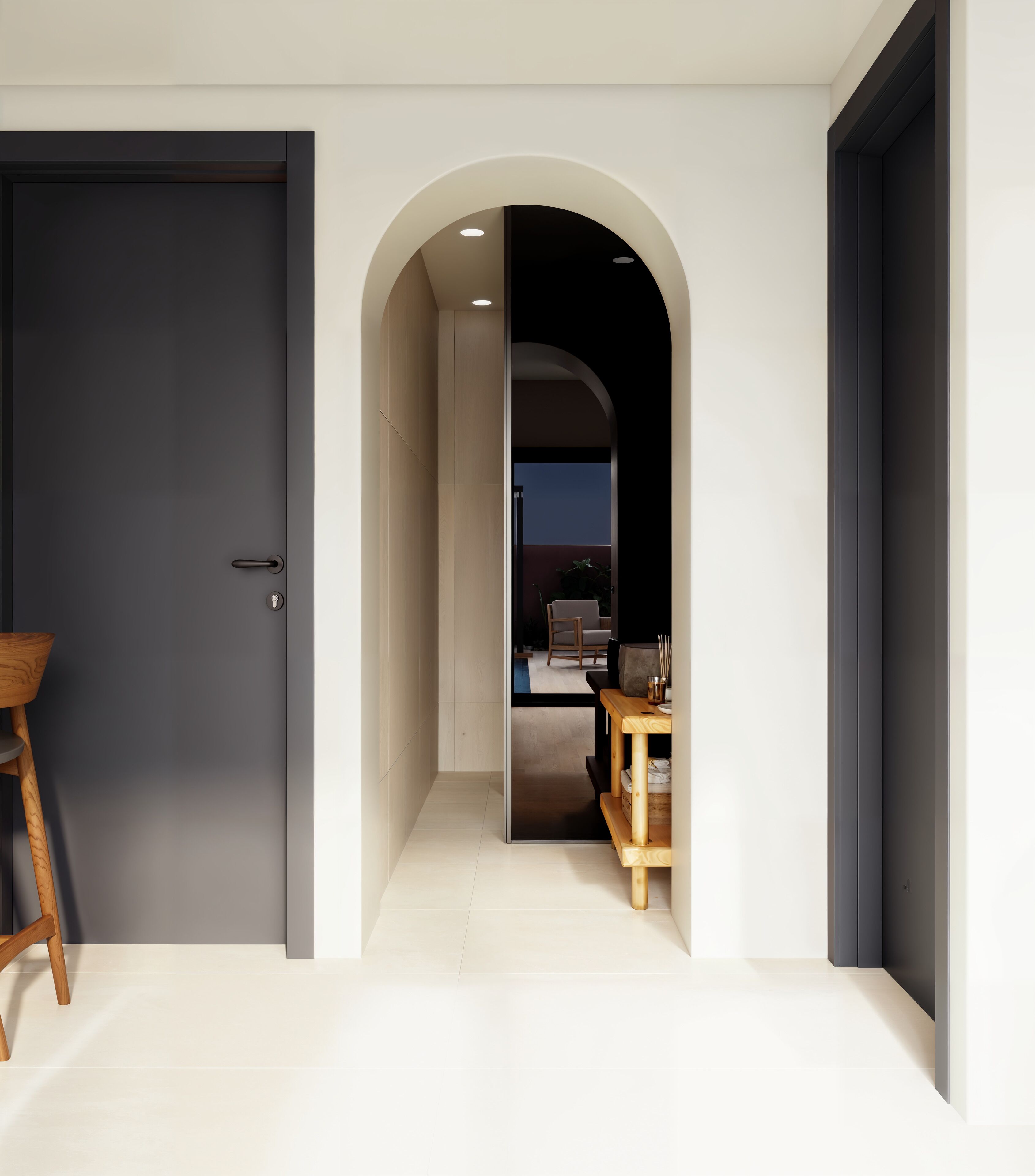 A hallway with a dark door on the left, a wooden chair, and a table with items on it.