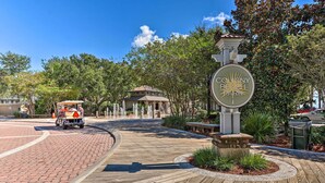 A wooden boardwalk leading to a gazebo with a sign reading "Colony Beach Park". - Walk to Beach: Peaceful Hilton Head Island Condo (Hilton Head Island)