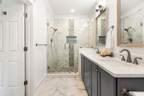 Shower, hair dryer, towels