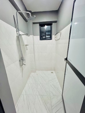 Shower, bidet, towels, soap
