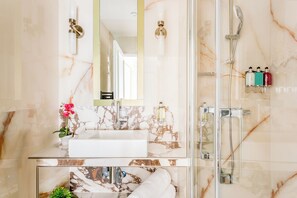 Apartment, City View | Bathroom | Rainfall showerhead, eco-friendly toiletries, hair dryer, towels - Merveil Luxury Suite - Aboukir VII (Paris)