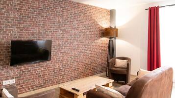 Cottage Confort, vue jardin | Coin séjour