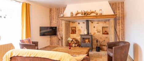 Chaumière Deluxe, vue sur le jardin | Aire de séjour