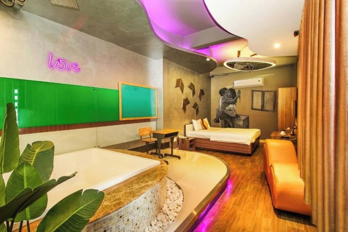 Habitación con 2 camas individuales | Cortinas opacas y tabla de planchar con plancha