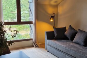 Comfort Apartment, Mountain View | Living area | Flat-screen TV - Tierra Boutique Apartamentos (Biescas)