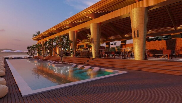 A modern pool area with wooden decking, lounge chairs, and a pool with a unique design. - Mad Monkey Kampot (Kampot)