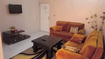 Chambre Exclusive | Coin séjour