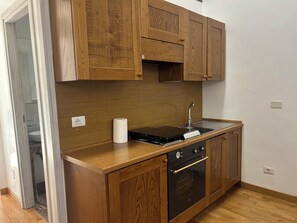 Stovetop, cookware/dishes/utensils, dining tables - San Vitale by GHOR - Two Bedroom Apartment, Sleeps 6 (Rome)