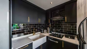 Villa | Private kitchen | Fridge, stovetop, dishwasher, cookware/dishes/utensils