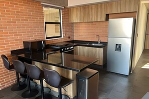 Fridge, microwave, oven, coffee/tea maker - Penthouse with stunning views of the city of Puebla. (Puebla)