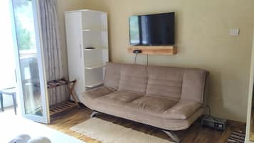 Deluxe Double Room, Balcony | Living area