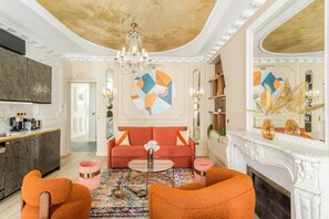 Apartment, City View | Living area | 43-inch Smart TV with cable channels, Netflix, streaming services - Merveil Luxury Suite - Boissy (Paris)