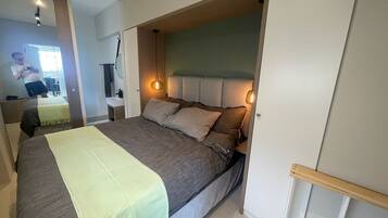 2 عدّة غرف نوم ومكواة/لوح كي وواي فاي مجانًا وملاءات أسرّة