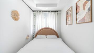 Blackout drapes, soundproofing, iron/ironing board, free WiFi