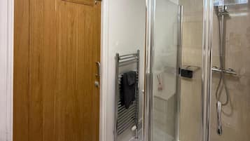 Shower, towels, toilet paper