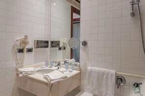 Free toiletries, hair dryer, towels, toilet paper