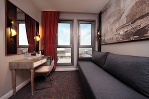 Deluxe Triple Room, City View | Desk, laptop workspace, free WiFi