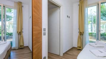 Bungalow Standard, patio, vista giardino | Culle/letti per bambini (a pagamento), Wi-Fi gratuito, lenzuola