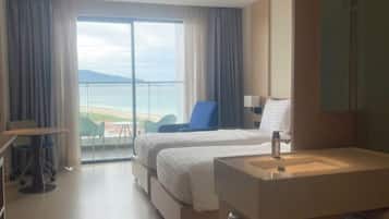 Chambre Deluxe Double ou avec lits jumeaux, balcon, vue plage | Bureau, Wi-Fi gratuit