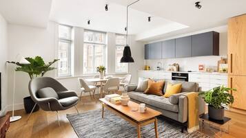 Open Plan One Bedroom Apartment | Living area | 40-inch Smart TV with satellite channels