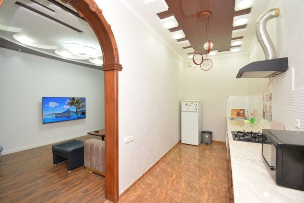 Classic Apartment, 2 Bedrooms | Private kitchen | Full-sized fridge, microwave, stovetop, electric kettle