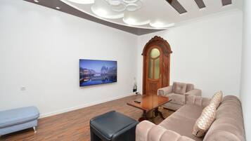 Departamento clásico, 2 habitaciones | Área de sala de estar