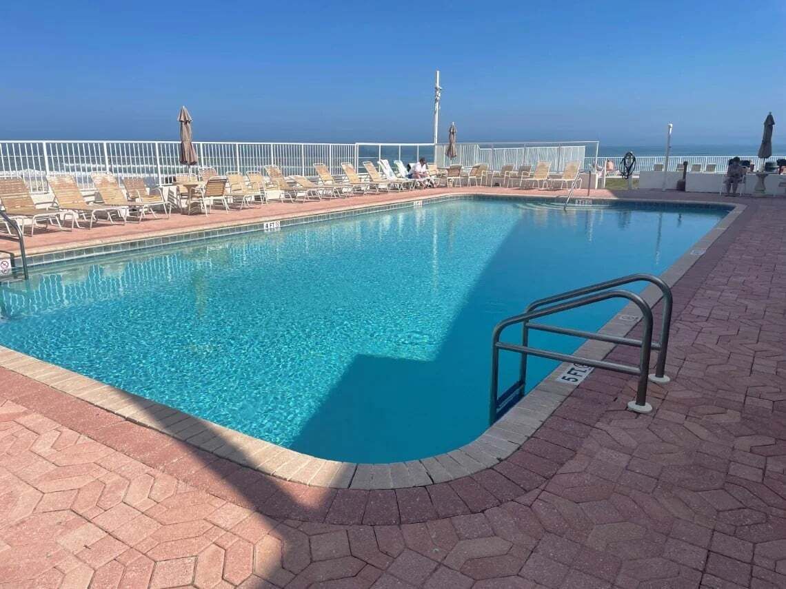 Outdoor pool, pool umbrellas, pool loungers