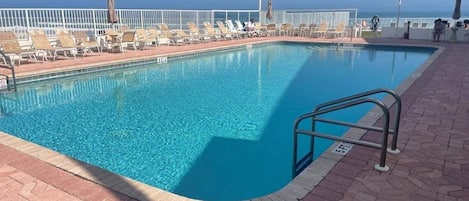 Outdoor pool, pool umbrellas, pool loungers