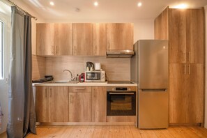 Comfort Apartment, City View | Private kitchen