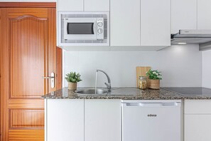 Apartment, 1 Bedroom | Private kitchen | Mini-fridge