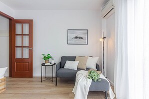 Apartment, 1 Bedroom | Living room | 22-inch flat-screen TV with digital channels