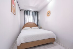 Verdunkelungsvorhänge, schallisolierte Zimmer, Bügeleisen/Bügelbrett