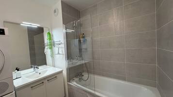 Hair dryer, towels, soap, toilet paper