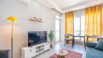 Family Condo, 2 Bedrooms, Non Smoking, Balcony | Living area | 32-inch Smart TV with satellite channels