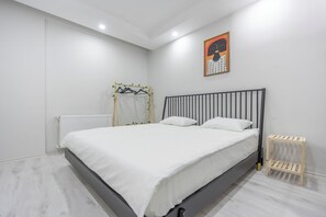 Family Condo, 2 Bedrooms, Non Smoking, Balcony | Blackout curtains, soundproofing, iron/ironing board, free WiFi