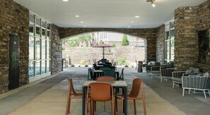 Outdoor dining - Landing | Stylish 1BD, Rooftop Lounge, Yoga Studio (Raleigh)