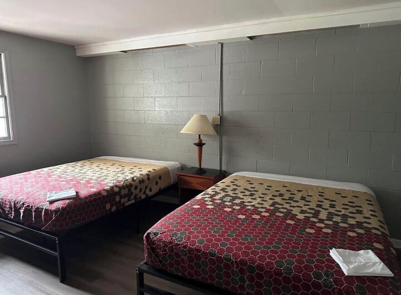 Deluxe Studio, 2 Queen Beds | Desk, free WiFi, bed sheets