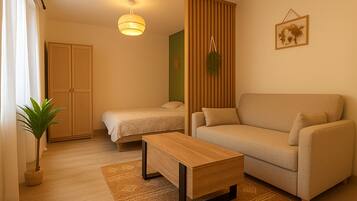 1 slaapkamer, een strijkplank/strijkijzer, wifi, beddengoed