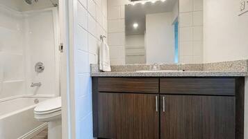 Hair dryer, towels, soap, shampoo