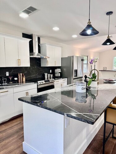 Modern 4BR Retreat w/ Hot Tub & Huge Backyard