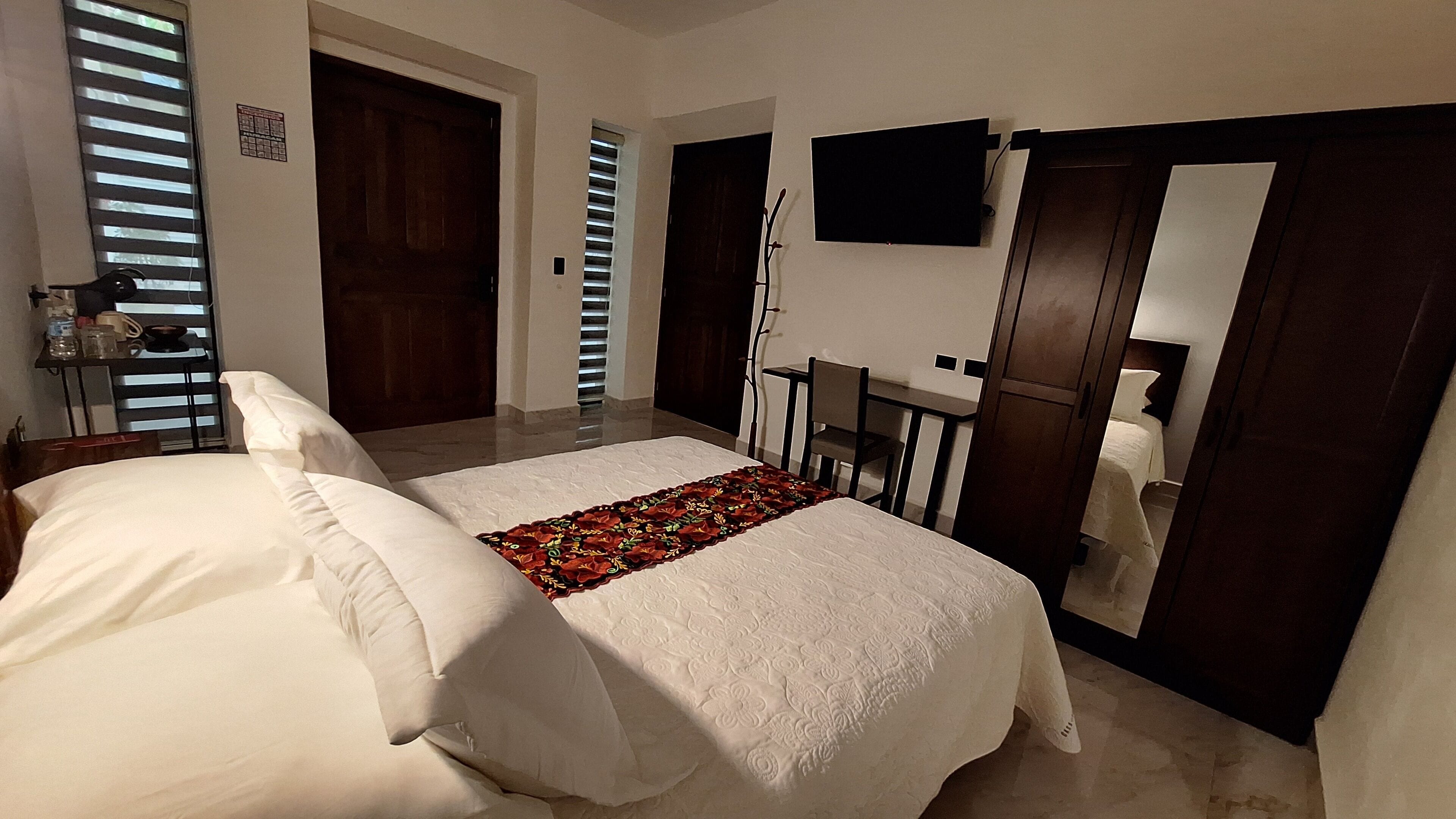 Desk, laptop workspace, free WiFi, bed sheets