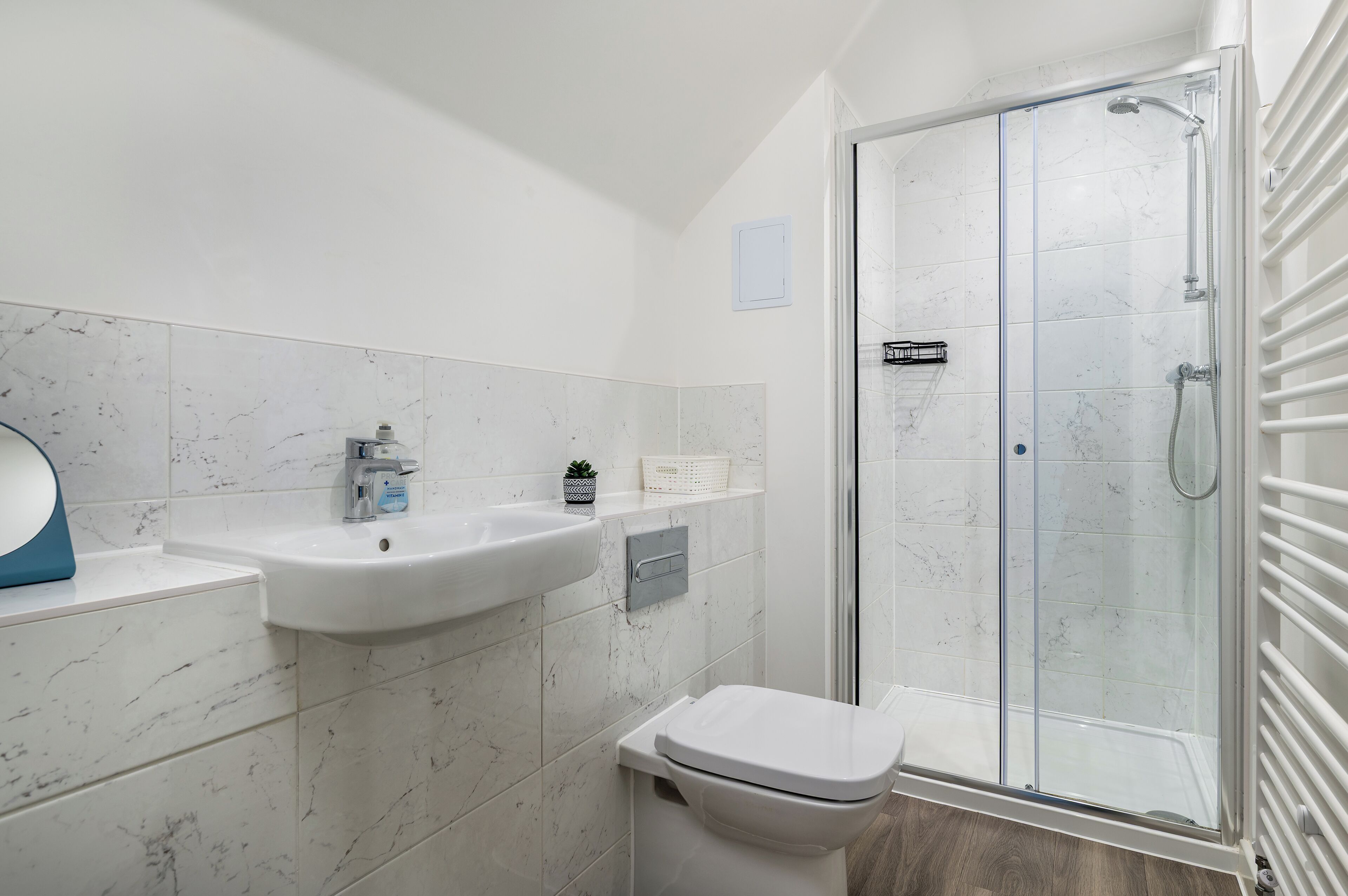 Shower, hair dryer, towels, soap