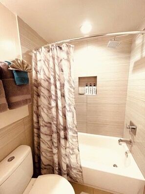Hair dryer, towels, soap, shampoo